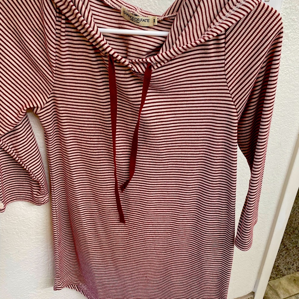 Tunic length 3/4 sleeve hoodie. Size medium fits like small. Only worn few times